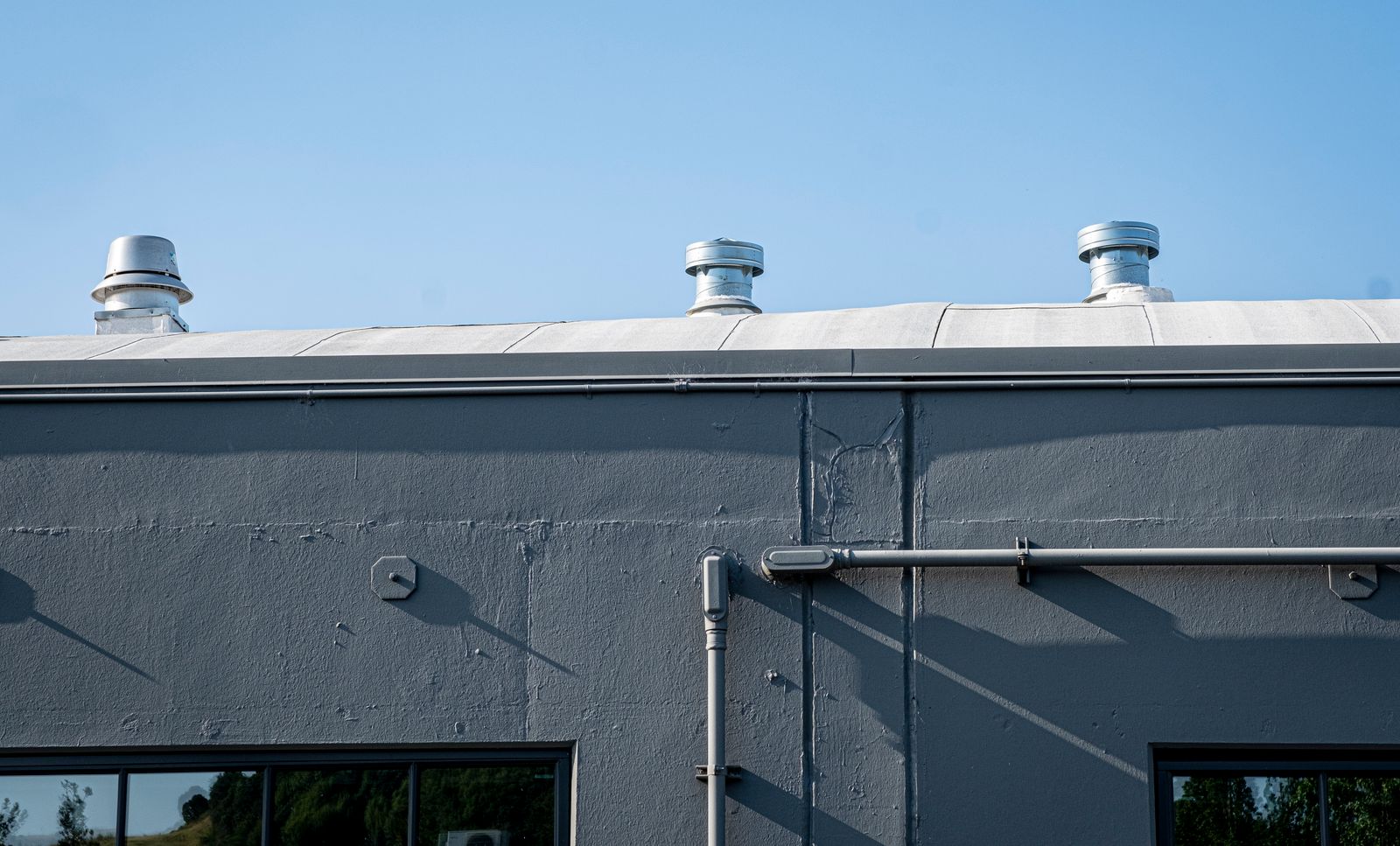 Modern commercial building with rooftop units